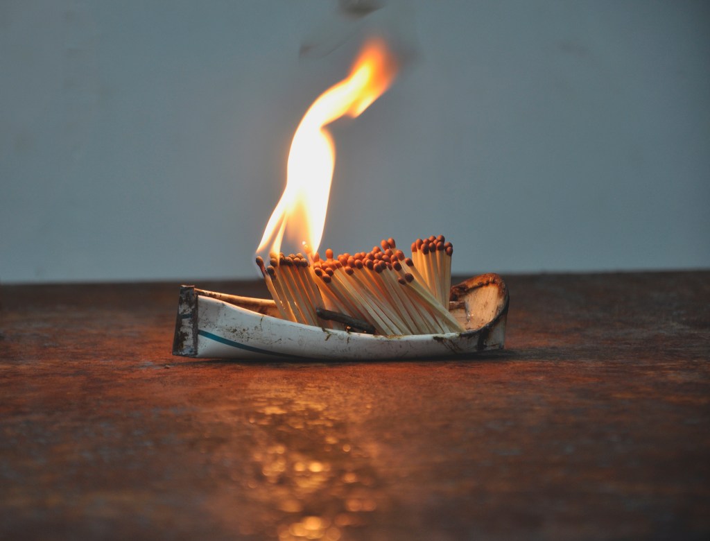 A photo of Issam Kourbaj's work, 'Dark Water, Burning World'.